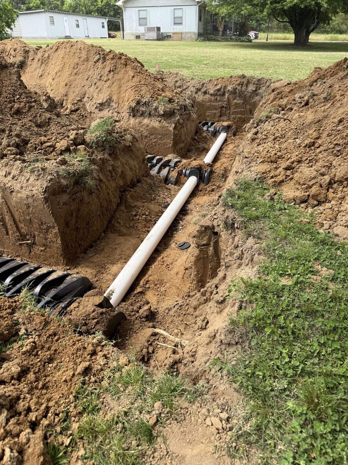 Septic pipe and trench work in progress